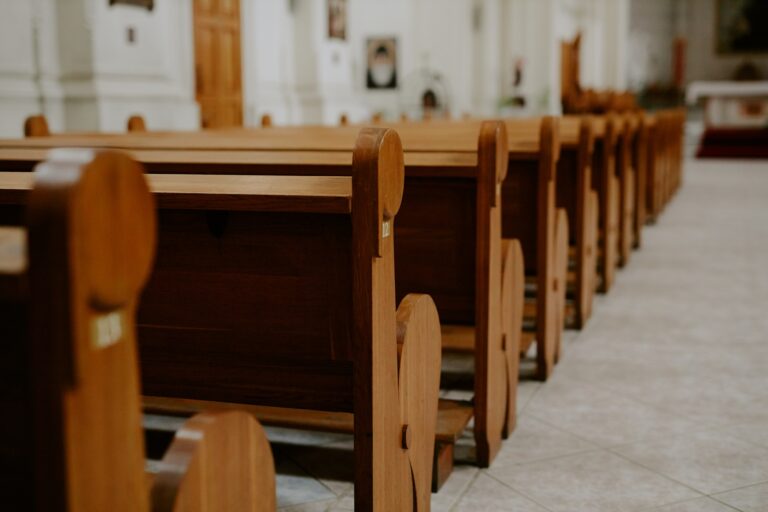 Wooden Benches In Catholic Church